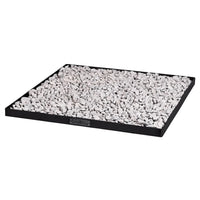 Plateau rectangulaire noir rempli de cailloux blancs, probablement en céramique ou en plastique.