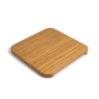 Ensemble de sous-verres en bambou avec bords arrondis et veinage naturel du bois.