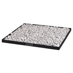 Plateau rectangulaire noir rempli de cailloux blancs, probablement en céramique ou en plastique.