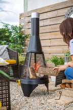 Brasero acier noir H125 cm avec grille mesh et flamme ouverte