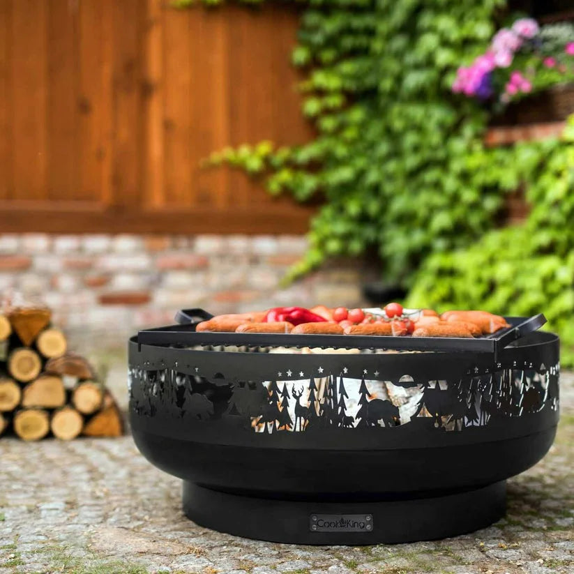 Foyer d’incendie noir avec design de silhouette de forêt, marque goodfire.