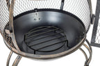 Foyer de feu en métal noir avec cage en maille et grille circulaire.