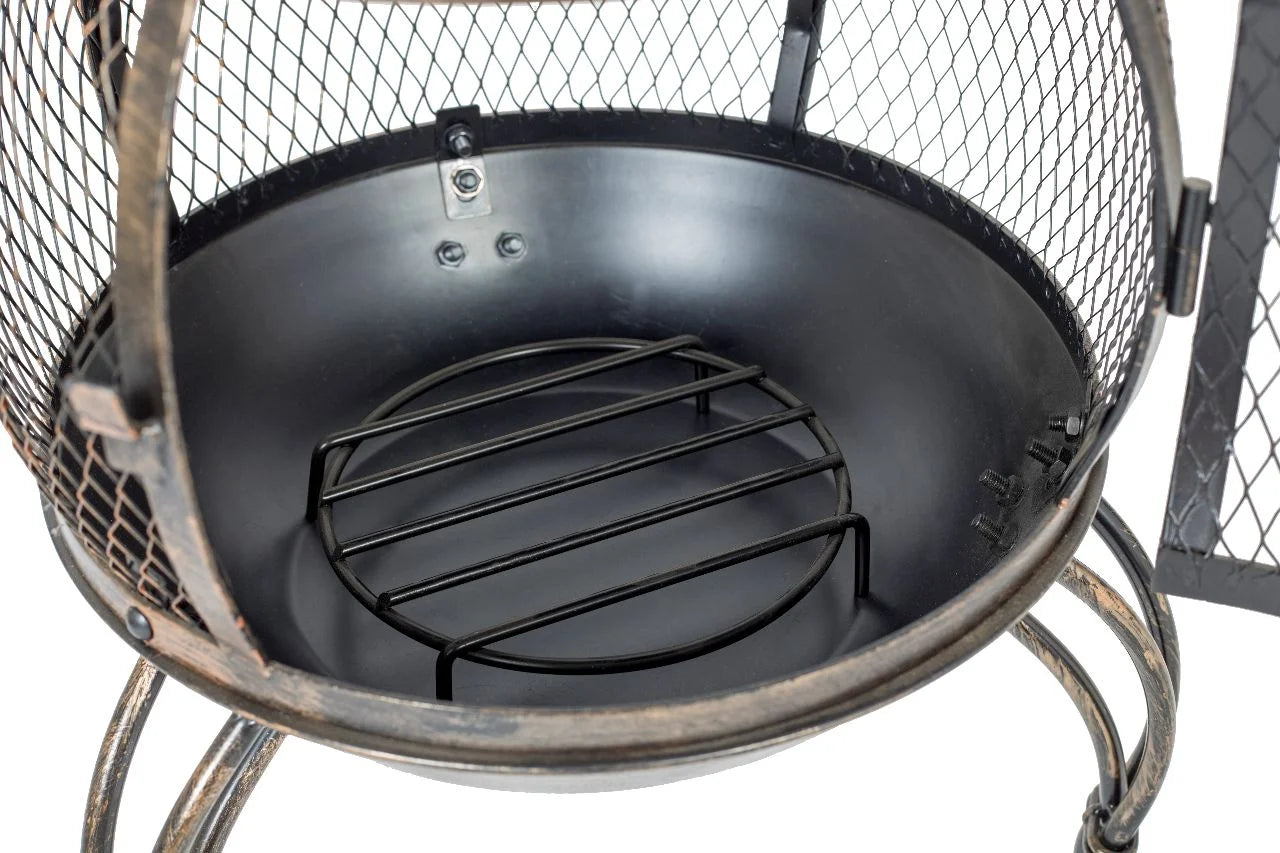 Foyer de feu en métal noir avec cage en maille et grille circulaire.