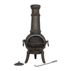Chimenea en fonte de couleur bronze foncé avec un corps arrondi, une grille frontale en maille et trois pieds robustes.