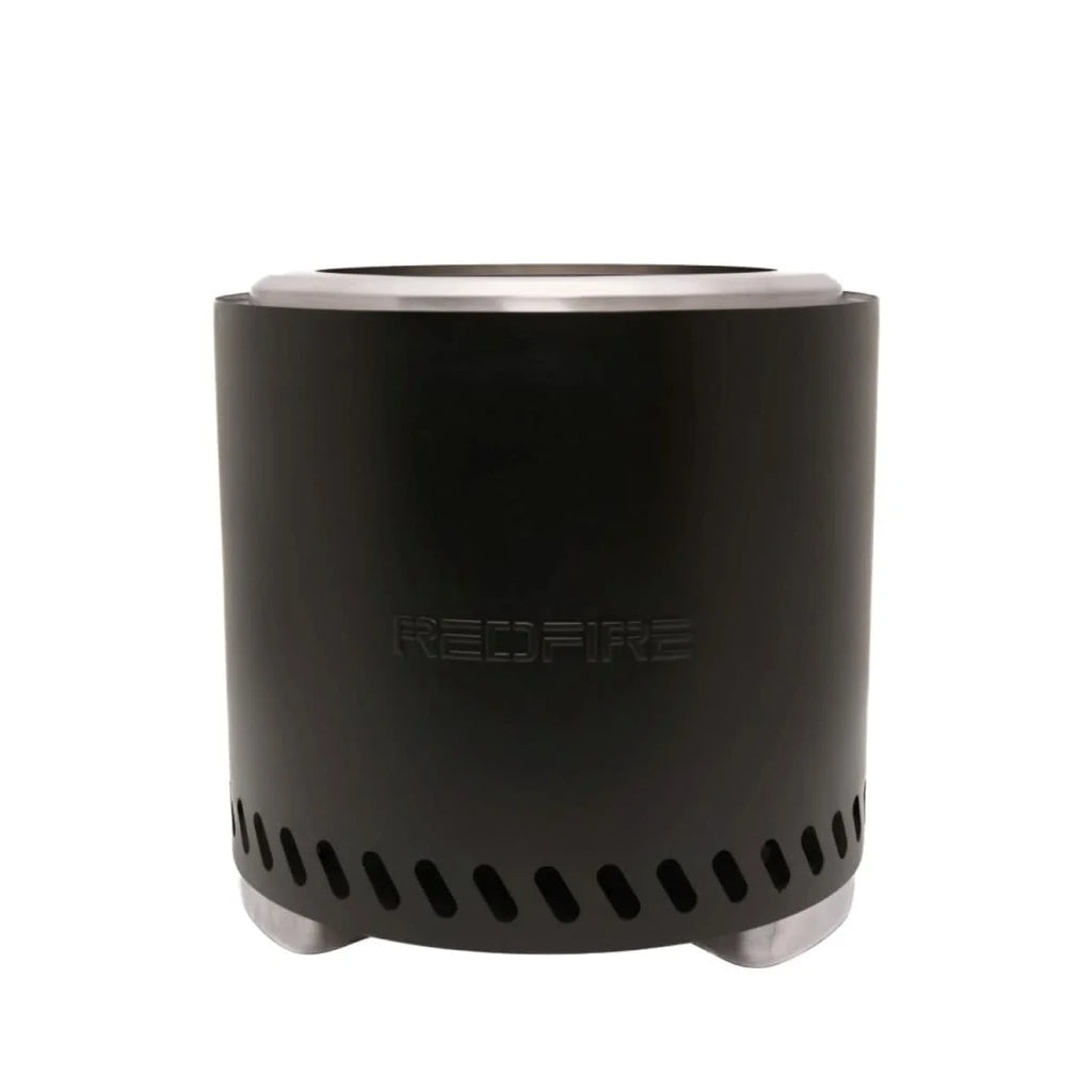Brûleur portable cylindrique noir avec un haut et une base argentés, arborant le nom de marque « redfire » en relief sur son côté.