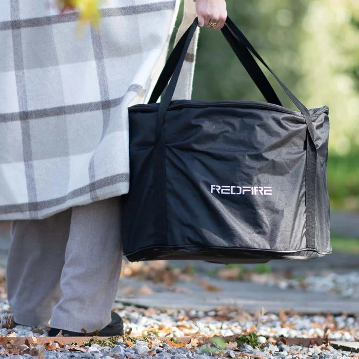 Sac de transport de la marque Black Redfire noir avec des poignées robustes et un logo discret sur le devant.