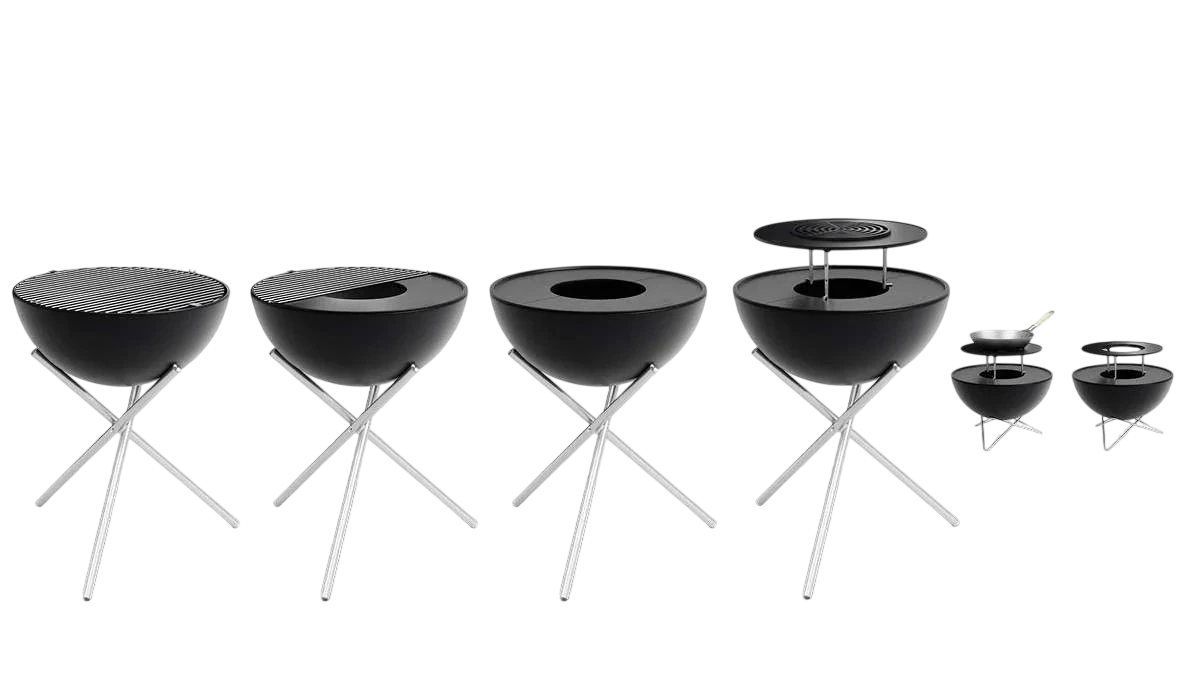 Barbecue portable noir et argent avec surfaces de cuisson interchangeables, incluant une grille de saisie et un anneau de réchauffage.