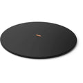 Support rotatif rond noir avec accents en cuivre et un logo central.