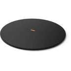 Support rotatif rond noir avec accents en cuivre et un logo central.