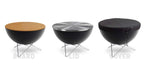 Table basse moderne noire avec un plateau en bois et des pieds métalliques, conçue par b&b italia.
