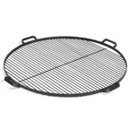 Grille ronde noire avec poignées et pieds pour la cuisson en extérieur.