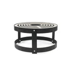 Anneau de foyer au motif spirale noir avec cadre en métal et pieds.