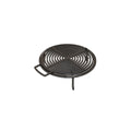 Grille circulaire noire avec design en anneaux concentriques et poignée latérale.