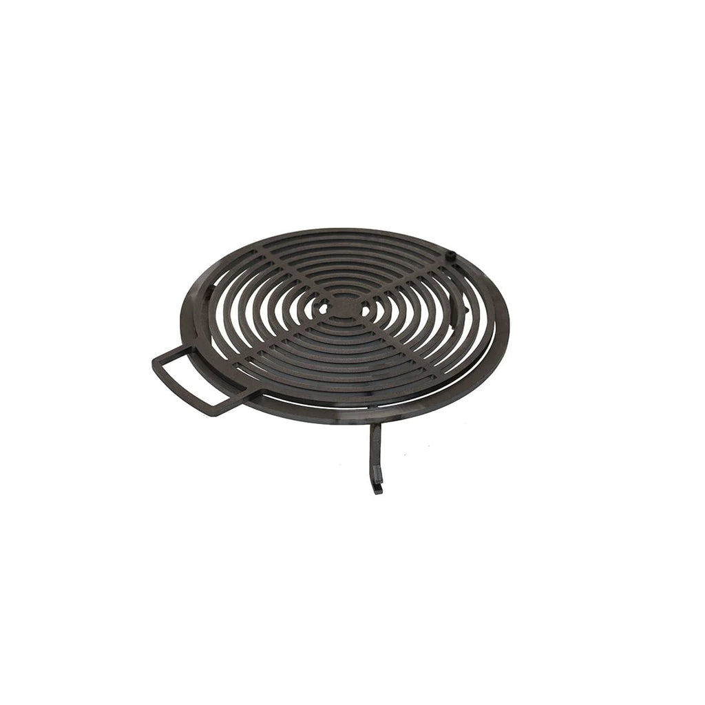 Grille de cuisson en fonte noire avec fentes circulaires concentriques et une poignée latérale.