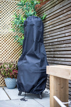 Cache-grille en tissu noir avec fermeture à cordon de serrage