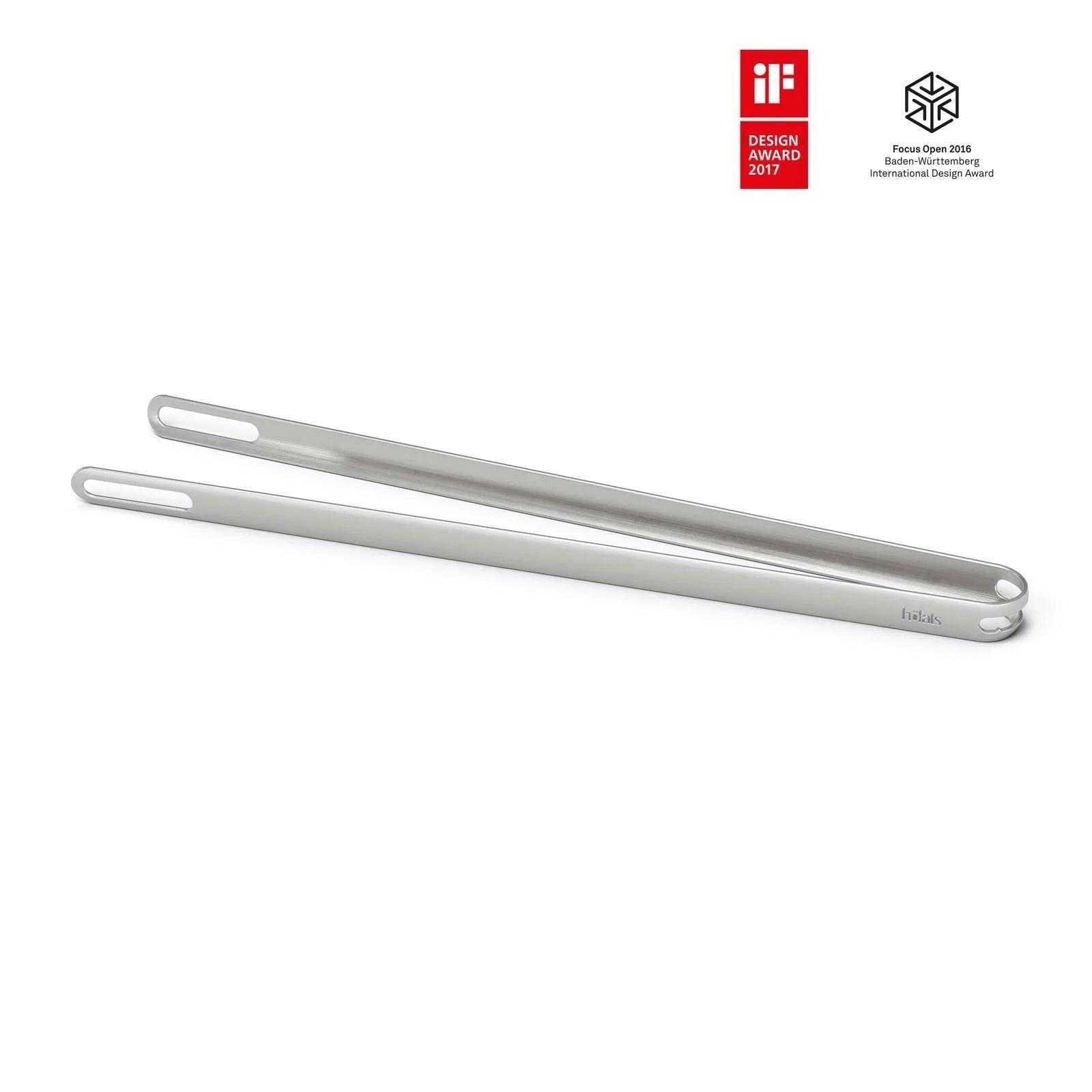 Support de baguettes en aluminium argenté avec un design épuré et minimaliste.