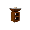 Foyer rustique en forme de bol de couleur cuivre, avec un dessus en pierre noire, monté sur un support en bois assorti.
