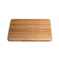 Planche à découper en bambou avec veinage et bords en bois naturel.