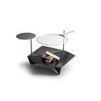 Gril géométrique noir moderne avec surface de cuisson circulaire et table latérale.