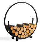 Porte-bûches en fer forgé noir avec design courbé et pieds sphériques