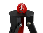Emblème rouge enflammé sur pied noir de trépied cuisson acier avec grille Ø60